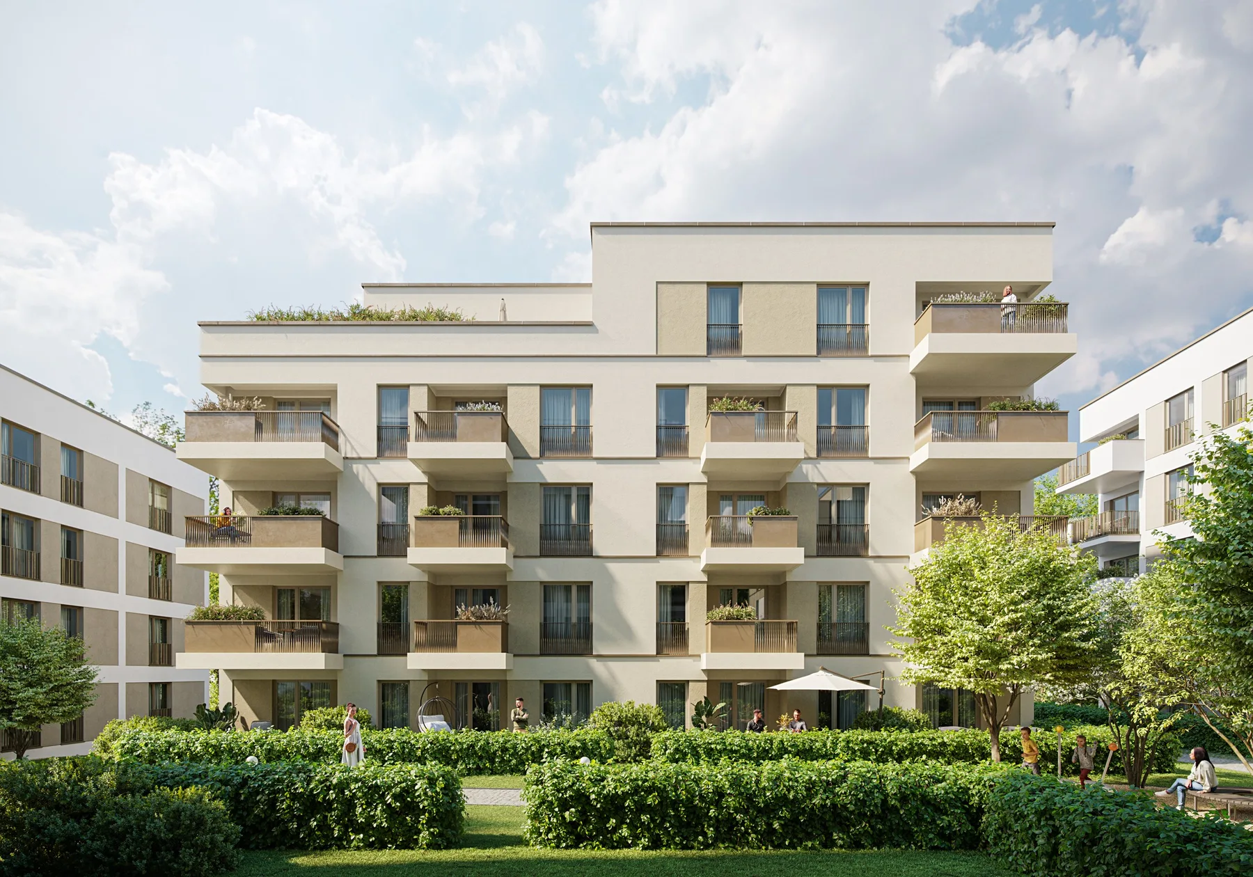 Gartenseite von Haus 2.3 mit Balkonen und Dachterrasse